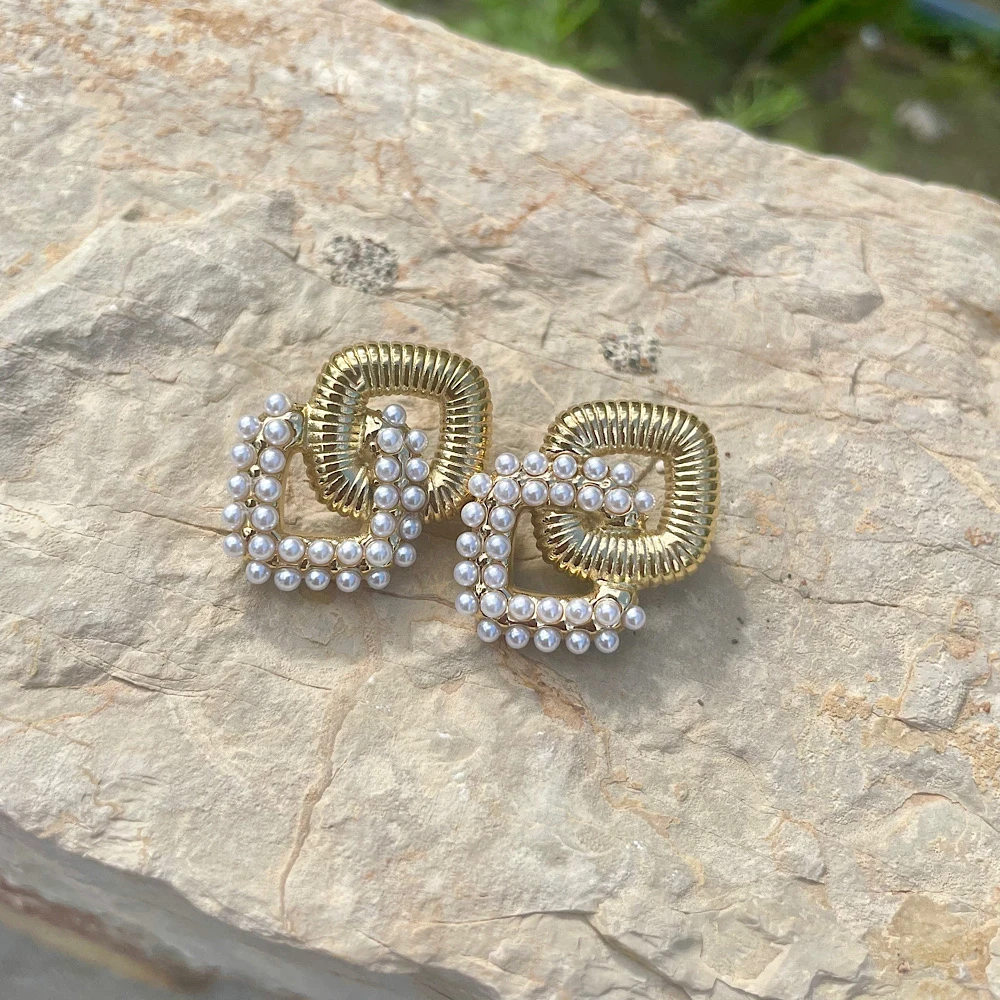 Golden Maze-Steel earrings.